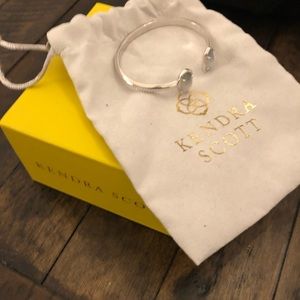 Lavender Kendra Scott bracelet. Only worn a few times. I have the box and bag.
